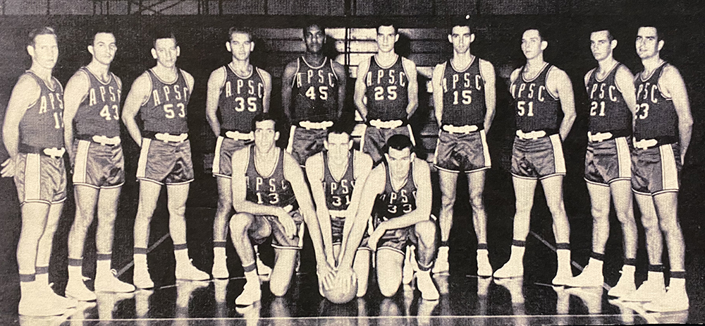 Austin Peay Special School Basketball team photo with L. M. Ellis standing in the middle.